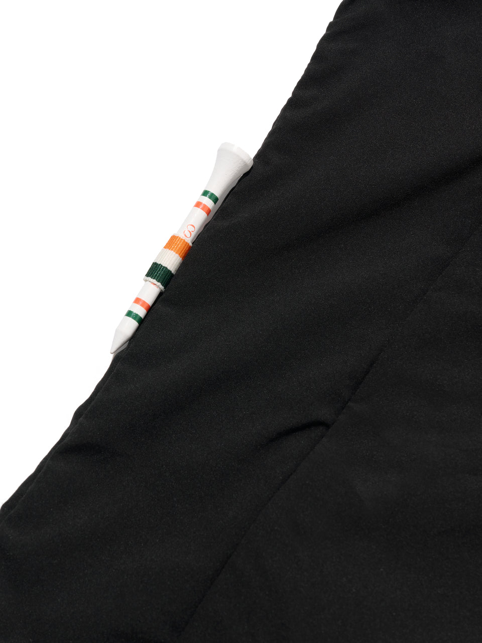 DRIVE Black golf wind jacket: golf tee holder detail